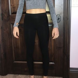black leggings with a leather accent
